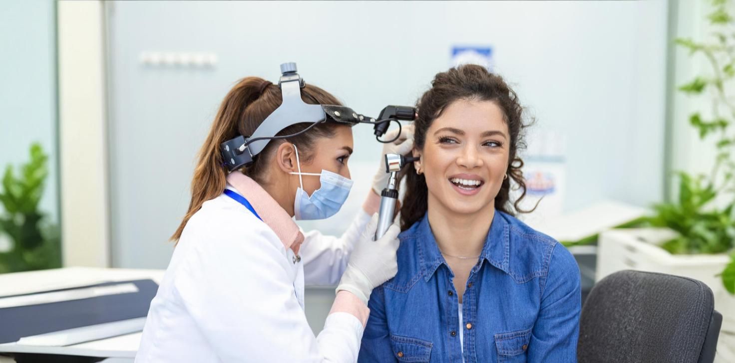 hearing-exam-otolaryngologist-doctor-checking-woman-s-ear-using-otoscope-auriscope-medical-clinic (1